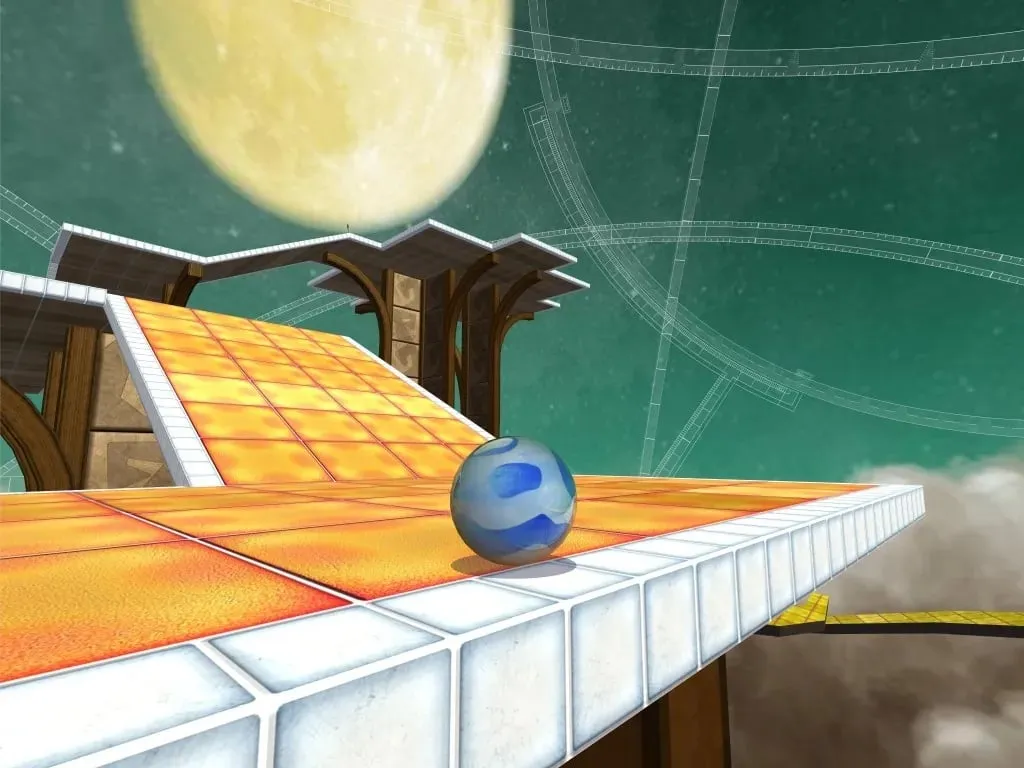 A marble on an orange tiled ramp beneath a full moon