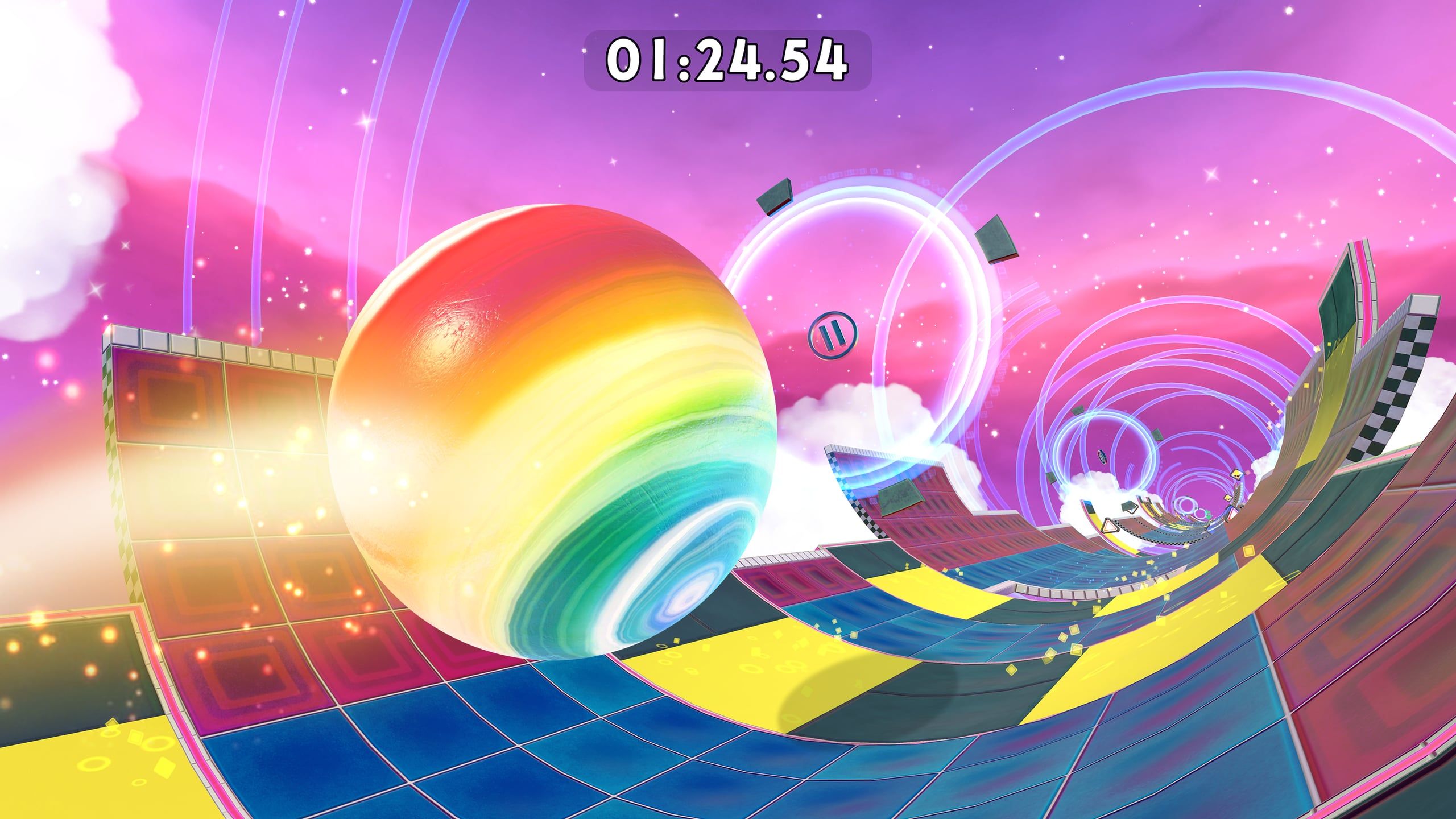 A rainbow marble racing along a curving track through a pink sky full of rings